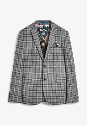 Blazer a quadri grigio con due bottoni, tasche con pattina e fodera interna floreale, con un fazzoletto floreale nella tasca sul petto sinistro.