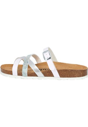 White sandal with three straps, including a textured silver one. Cork footbed, white outsole, and adjustable buckle detail.
