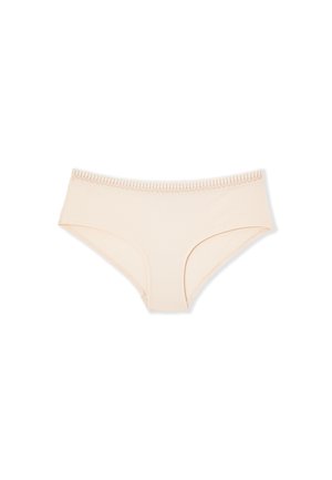 Beige katoenen slip met een gladde textuur, voorzien van geschulpte randen langs de tailleband en een eenvoudig, naadloos ontwerp.