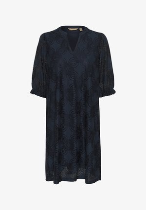 Tumesinine pitskleit V-dekoltee, puhvkäiste ja lillemustriga. Omab vabalt voolavat lõiget ja õrnalt volangiks lõigatud käiste servu.