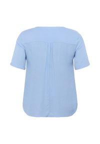 Blouse légère bleu clair à manches courtes avec une coupe décontractée, présentant un pli à l'arrière et un ourlet arrondi. Fabriquée dans un tissu doux et texturé.