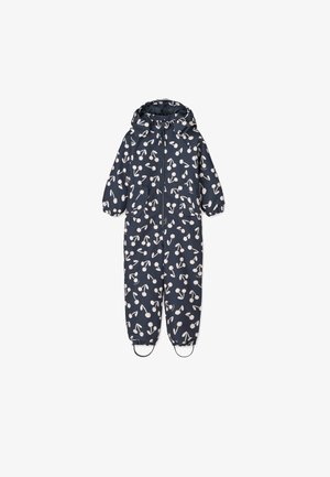 Tuta impermeabile intera blu navy con motivo bianco a ciliegie, polsini elasticizzati, cappuccio, zip frontale e due tasche laterali.