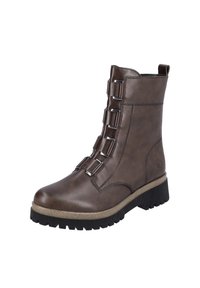 Botte marron mi-mollet avec semelle épaisse noire à crampons et quatre sangles réglables avec boucles métalliques sur le devant.