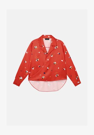 Piros blúz gallérral, hosszú ujjakkal és csomózott fazonnal. Színes virágmintákkal, sima anyaggal és ívelt aljjal rendelkezik.