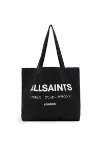 Black canvas tote bag featuring bold white text "ALLSAINTS" and smaller text in Japanese and "LONDON" at the bottom. Two long handles.