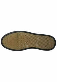 Suola di scarpa in gomma con un bordo esterno nero, centro color beige caratterizzato da un motivo a spina di pesce, logo inciso e dettaglio della taglia 42.