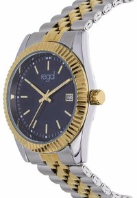 Armbanduhr aus Edelstahl in Gold und Silber mit schwarzem Zifferblatt, strukturiertem Lünettenring, Gelbgold-Akzenten und Datumsanzeige bei drei Uhr.