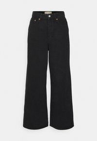 TOKYO - Calças de ganga bootcut - black denim