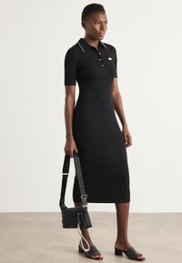Lacoste Dzsörzéruha - black