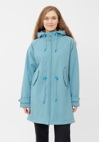 Giacca lunga di un blu chiaro con cappuccio, caratterizzata da dettagli con cordino, tasche laterali e chiusura con zip. Tessuto liscio e maniche lunghe.