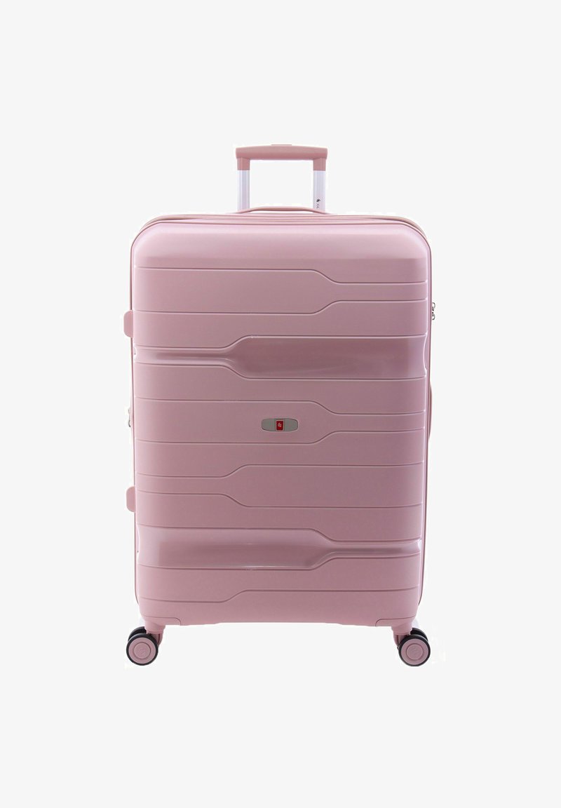 Valigia rigida di colore rosa soft, caratterizzata da un design elegante con texture ondulate, una maniglia retrattile e quattro ruote per una facile mobilità.