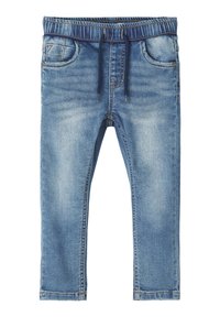 Pantalons de jogging en denim bleu avec une taille élastique, un cordon de serrage, des poches avant et une coupe slim. Présente un effet délavé et des détails cousus.