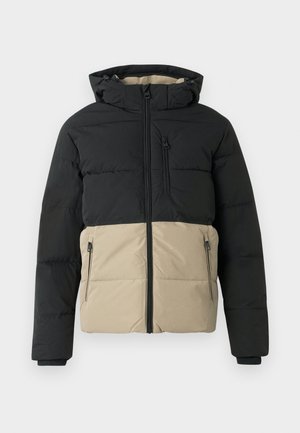 Giubbotto imbottito con parte superiore nera e parte inferiore beige. Presenta una cerniera frontale, tasche laterali con zip e cappuccio. Tessuto testurizzato.
