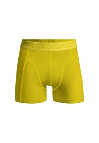 Rumene bokserice z oprijemom, narejene iz zračnega materiala. Imajo elastičen pas za udobje, logotip na pasu in kontrastne šive.