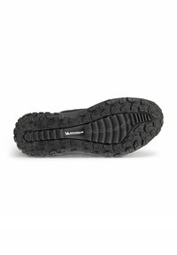 Soletta in gomma nera con un motivo di battistrada multidirezionale, caratterizzata da texture rialzate e un logo Michelin discreto al centro.
