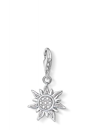 Silver sun-shaped charm with a lobster clasp, featuring a round center embellished with small crystal-like stones.