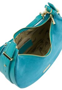 Türkise Wildleder-Handtasche mit Reißverschluss, goldfarbener Hardware und einem gemusterten Innenfutter mit dem Markennamen "Venezia."
