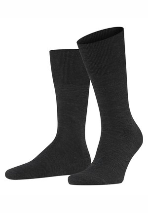 Graue Crew-Socken aus einem weichen, strukturierten Stoff mit einem gerippten Bündchen und glatter Spitze. Verfügen über ein klassisches Design, das für verschiedene Anlässe geeignet ist.