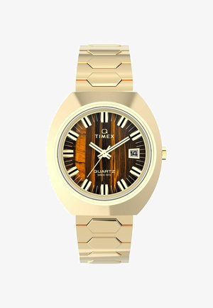 Złoty zegarek kwarcowy z ośmiokątną kopertą, tarczą o drewnianej fakturze, wyraźnymi znacznikami godzin i bransoletą z sześciokątnych ogniw. Wyświetlacz daty na godzinie 3.