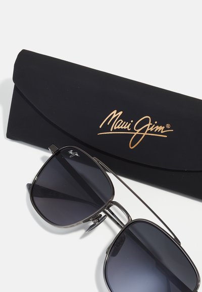 Maui Jim sunglasses with a metallic black frame, square lenses, and a black protective case featuring a gold logo.