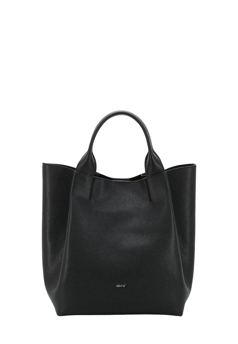 Sac fourre-tout en cuir noir avec double anses, texture douce, large ouverture et détail de logo sur le devant. Design minimaliste sans quincaillerie visible.