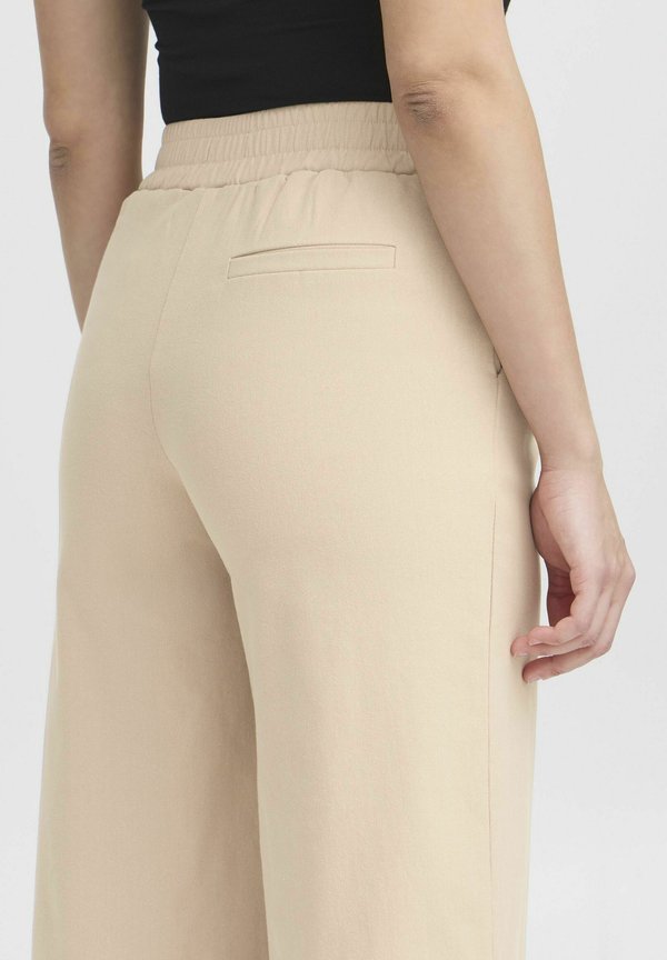 IHKATE - Flared Jeans - doeskin2