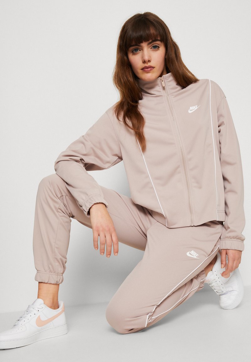 beige nike womens tracksuit