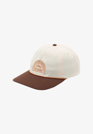 Hvid og brun kasket med buet skygge, med et rundt broderet logo med bjergmotiv og tekst "Adventure Division Billabong" på frontpanelet.