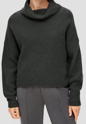 Pull en maille vert foncé avec un col cheminé, texture côtelée et épaules tombantes. Présente une coupe ample et un ourlet droit.