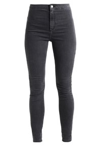 Černé skinny džíny s vysokým pasem, zapínání na knoflík, přiléhavé přes boky a nohy, s viditelným prošíváním a jemným vyblednutím.