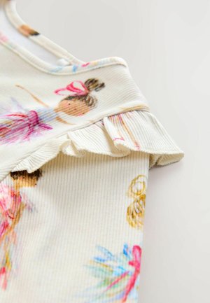 Haut pour enfants en tissu côtelé, avec une base crème ornée d'imprimés colorés de danseuses de ballet et un col à volants.