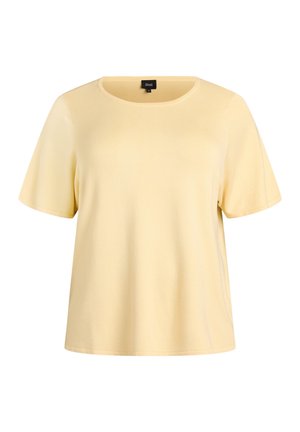 Žlté tričko s krátkym rukávom vyrobené z hladkej látky, s okrúhlym výstrihom a uvoľneným strihom, so čistými, jednoduchými švami.