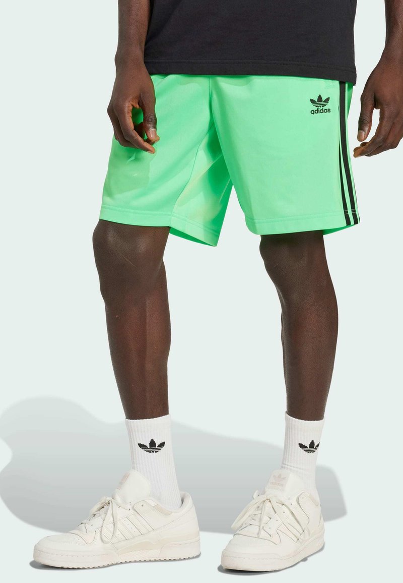 adidas Originals FIREBIRD - Tracksuit bottoms - screaming green   black