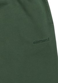 Groene katoenen shorts met een zachte textuur, voorzien van een reliëf logo, minimalistisch ontwerp en een elastische tailleband.