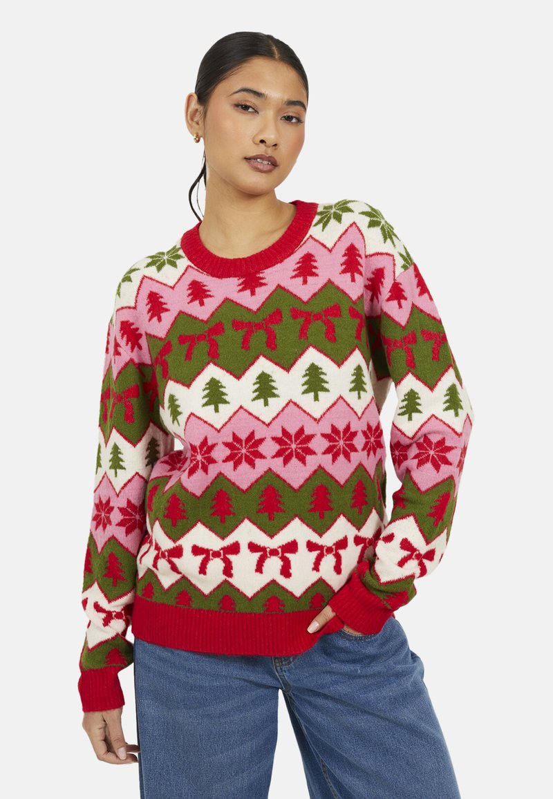 Maglione lavorato a maglia con motivo geometrico nei colori rosso, verde e rosa, con alberi, fiocchi e fiocchi di neve. Collo e polsini a coste rossi.