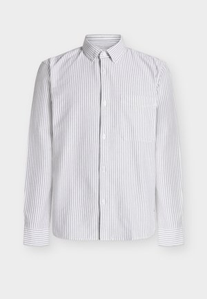 Πουκάμισο με μακριά μανίκια σε λευκό χρώμα με λεπτές γκρι κάθετες ρίγες, γιακάς με κουμπιά, μία τσέπη στο στήθος και μανσέτες στα μανίκια. Βαμβακερό ύφασμα.