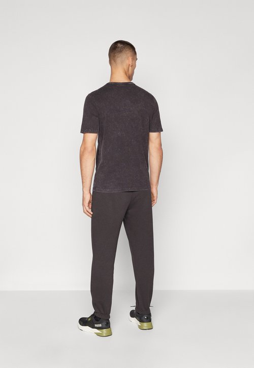 PUMA HYROX SWEATPANT - Tracksuit bottoms - black — photo 3