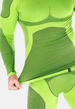 Neon green athletic bodysuit with textured accents, featuring mesh panels and a form-fitting design, highlighting areas with gradient patterns.