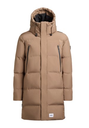 Beige puffer jacket with a high collar and detachable hood. Features black zippered pockets and a logo patch at the hem. Smooth, quilted texture.