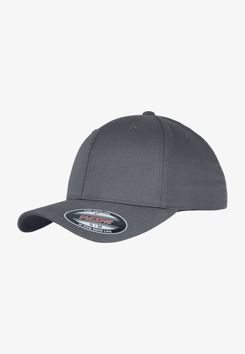 Gray Flexfit cap with a rounded crown and a curved visor. Made from textured fabric with a logo patch on the front.