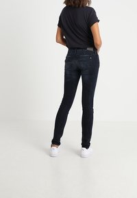 Replay Vaqueros pitillo - blue-black denim
