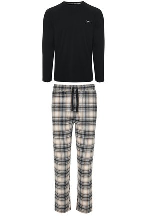 Long-sleeve black shirt with a V-neck and raglan sleeves paired with plaid pants in cream, black, and navy, featuring an elastic waistband.