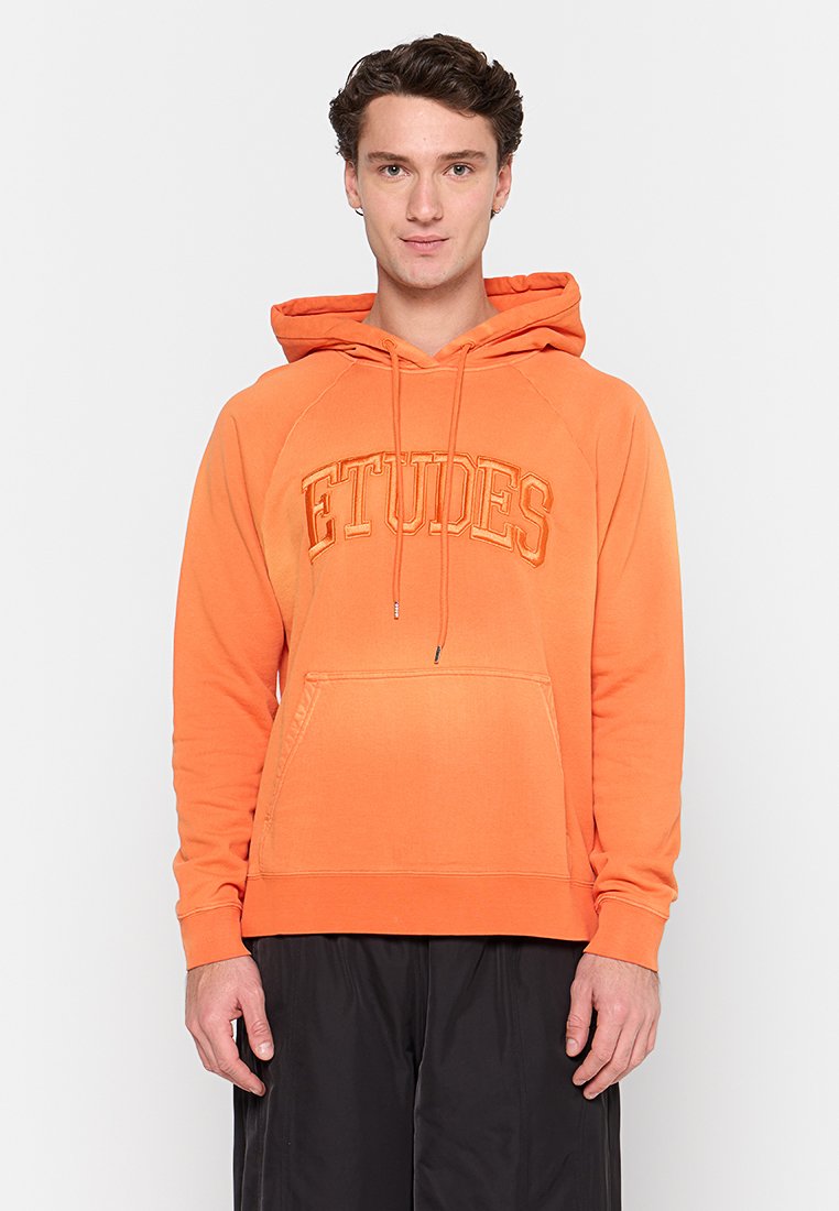Études Sweater oranje