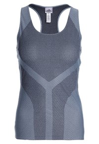 Débardeur de sport gris clair et gris foncé, respirant, en tissu perforé avec un dos nageur.
