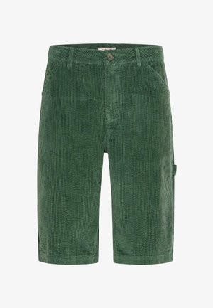 Zöld kordbársony rövidnadrág elülső gombolással, oldalzsebekkel és bordázott textúrával, egyenes szabással.