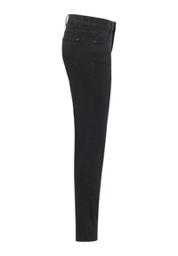 Fekete skinny farmerek oldalról bemutatva, jellegzetes hátsó zsebtervezéssel és tiszta, kifinomult megjelenéssel.