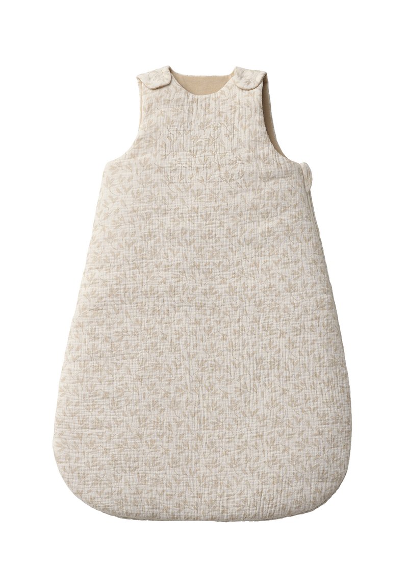 Gepolsterter Schlafsack aus weichem beige Stoff mit leichtem Blattmuster, runder Form und Schulterdrückknöpfen für einen sicheren Verschluss. Textur aus Baumwollmischung.