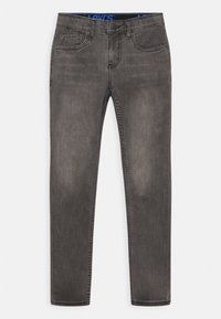 Tmavo šedé džínsy s úzkym strihom, s klasickým piatym vreckovým dizajnom a modrým logom Levi's na páse.