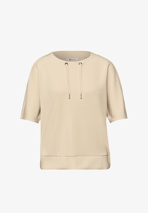 Sweatshirt beige à manches courtes avec encolure ronde et détails à cordon à l'avant, fabriqué en tissu lisse.