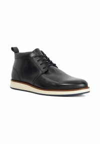 Black leather ankle boots with round toe, lace-up front, and contrasting white midsole. Features a pull tab for easy wear.